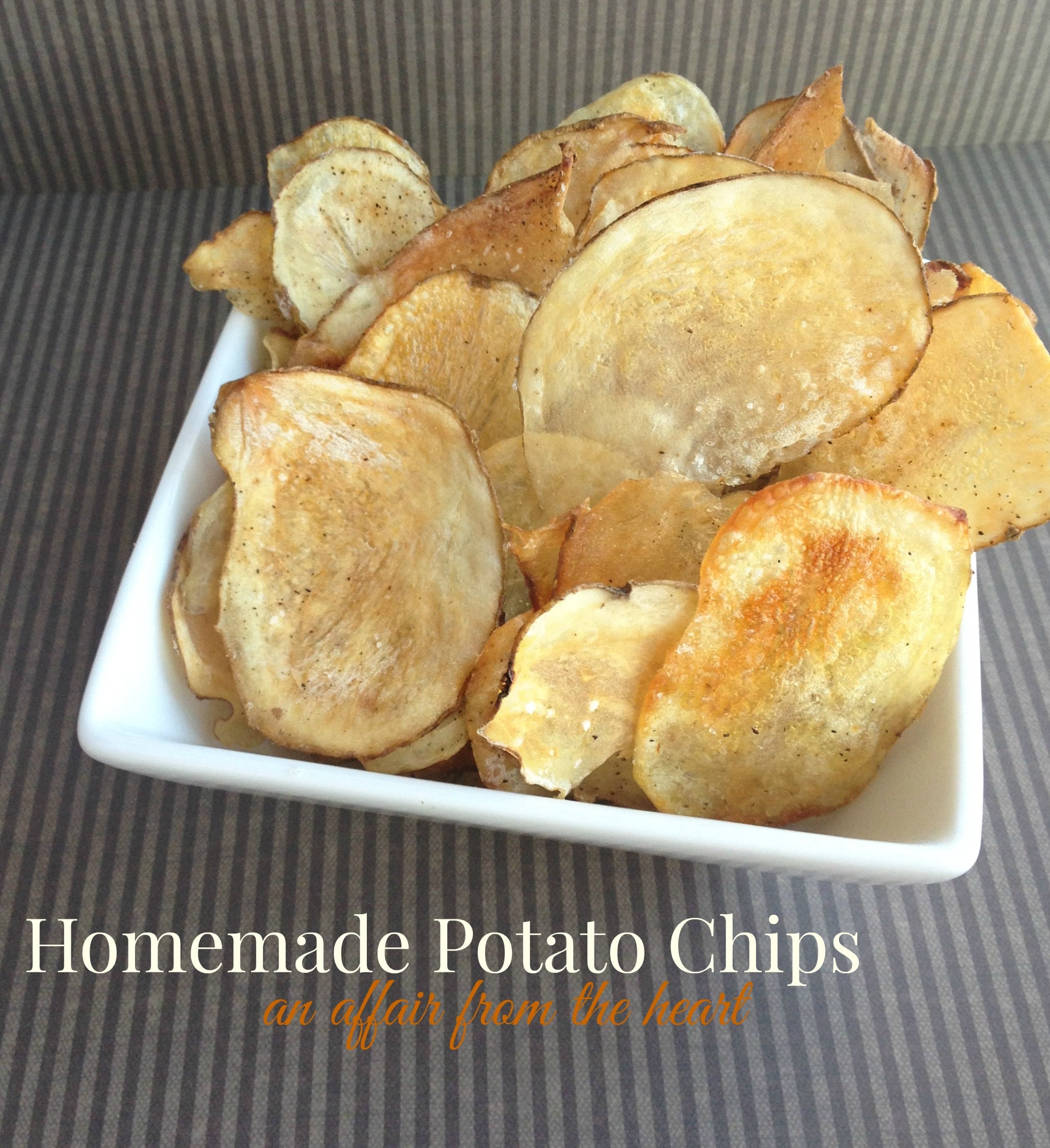 Homemade {baked} Potato Chips in a white serving bowl