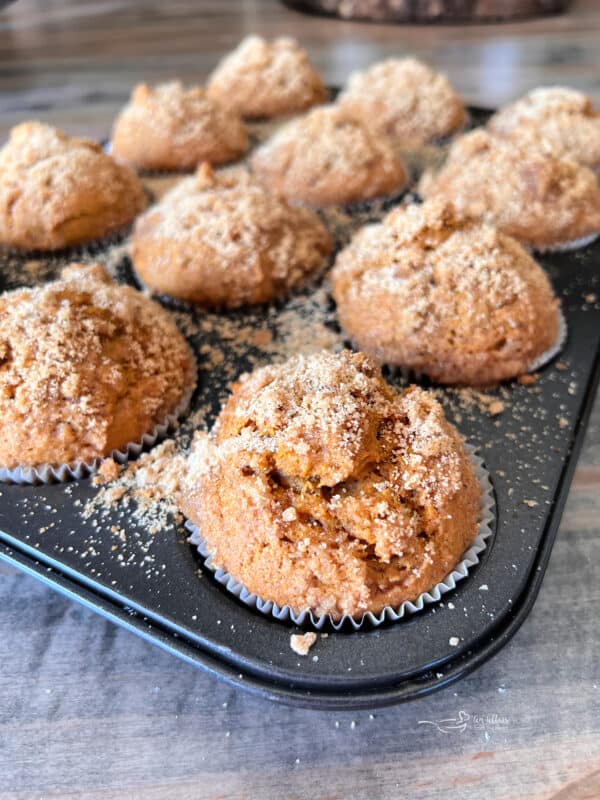 Close up of Pumpkin Spice Banana Muffins in a muffin tin