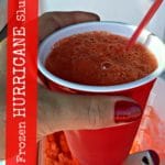 hand holding a frozen hurricane slush with text of the same