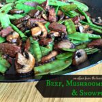 Close up of Asian Beef, Mushrooms and Snow peas in a wok with text ""Asian Beef, Mushrooms and Snowpeas"
