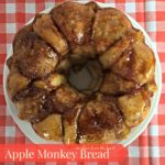 overhead of bread on a white serving platter with text "apple monkey bread"