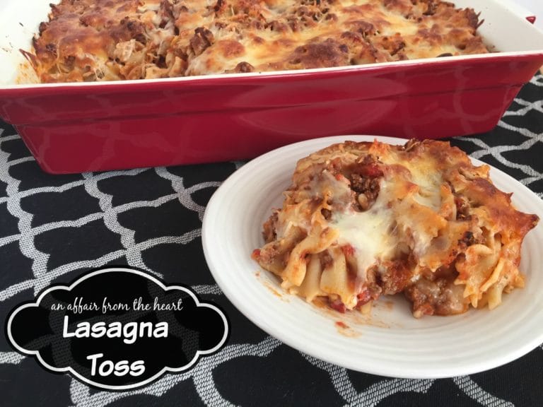 Lasagna in a casserole dish and a piece on a white plate with text "Lasagna Toss"