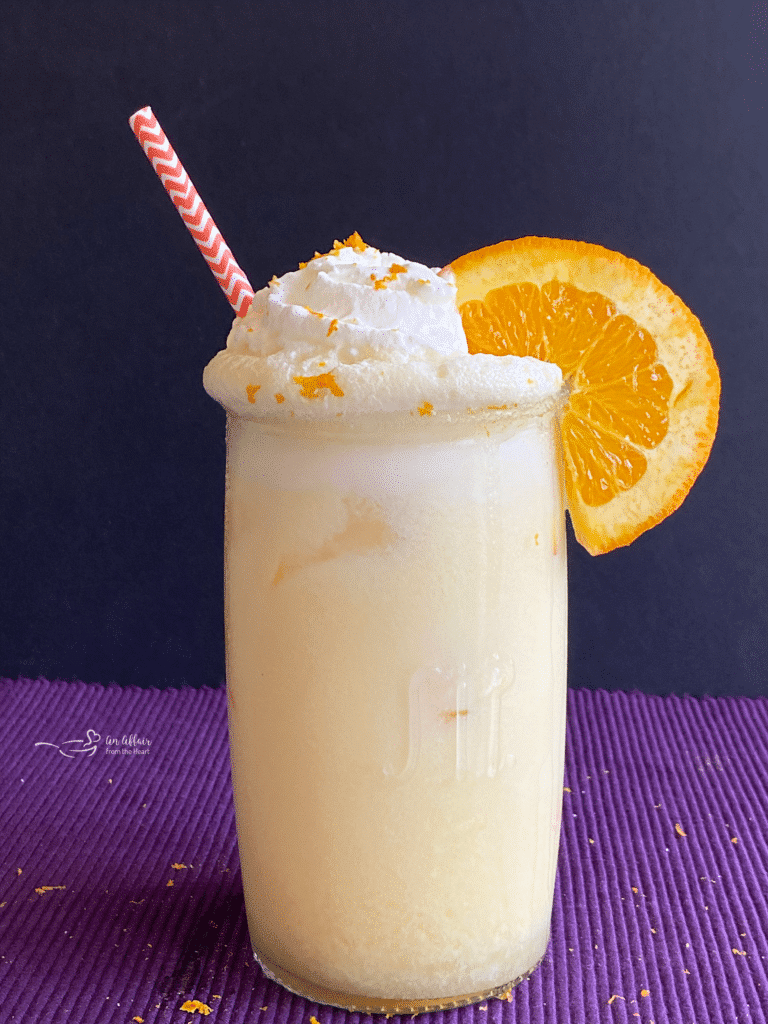 Grown Up Orange Julius purple background