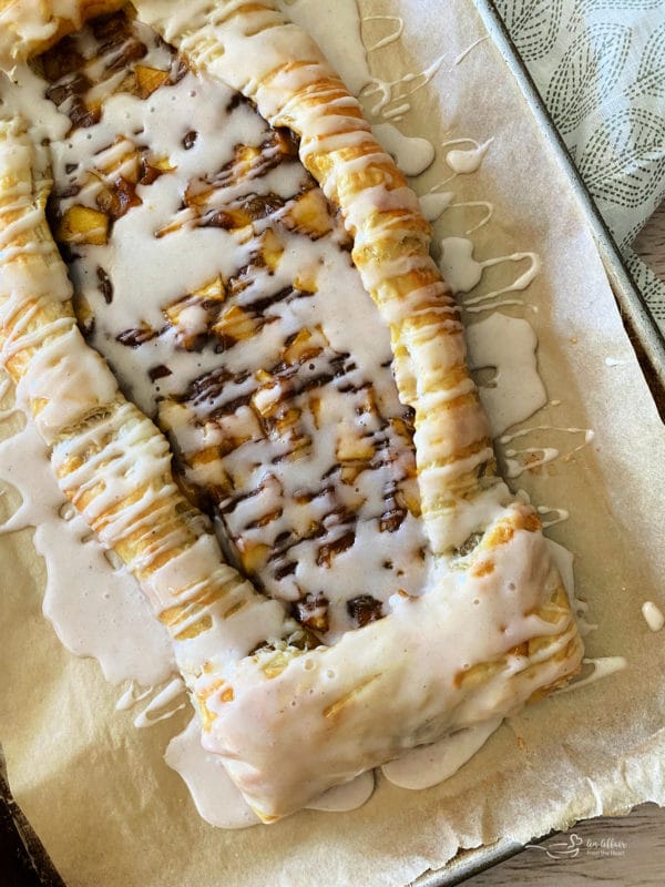 one baked apple pumpkin strudel with icing