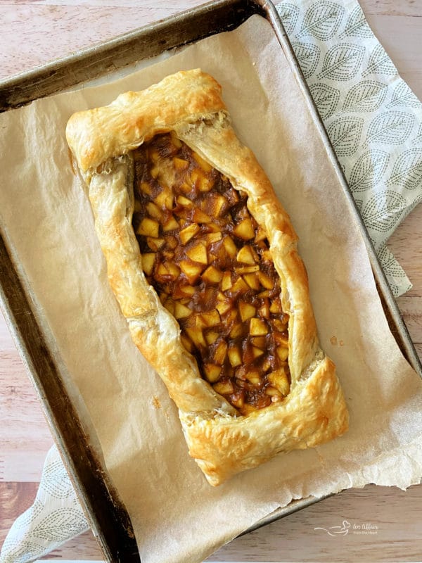 baked apple pumpkin strudel on baking sheet