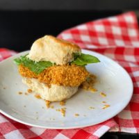 Crispy "Oven-Fried" Chicken in a Biscuit Sandwiches on white plate
