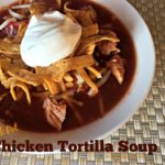 close up of Crock Pot Chicken Tortilla Soup in a white bowl