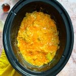 Slow Cooker Green Chile Chicken Enchilada Casserole in the slow cooker