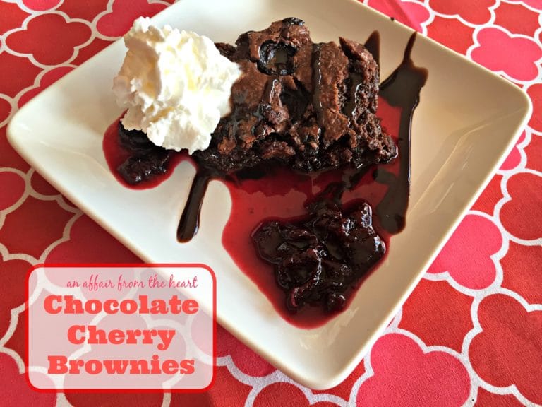 chocolate cherry brownie on a white plate with text "Chocolate Cherry Brownies"