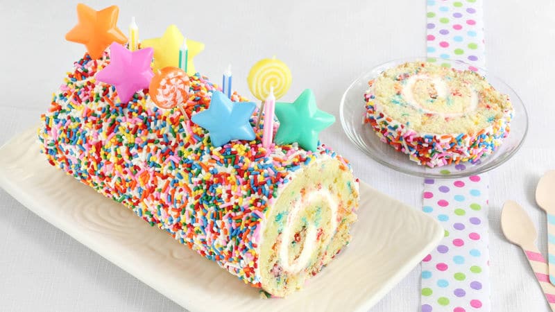 funfetti roll cake with candles