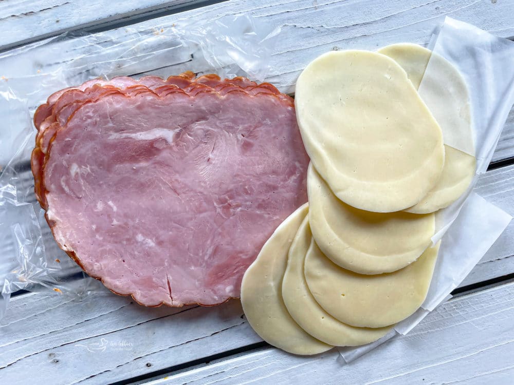 sliced ham and provolone cheese
