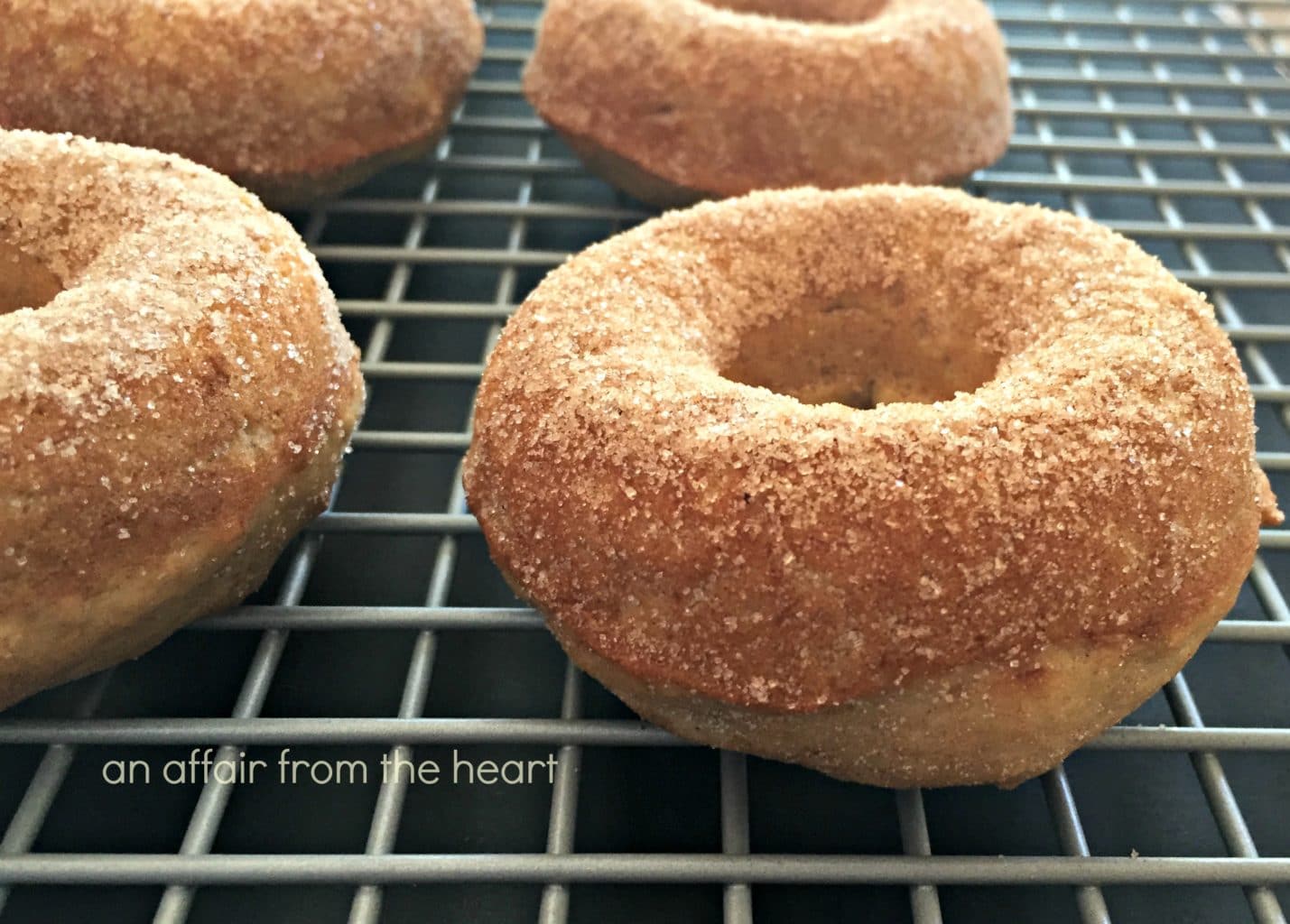 Close up of Baked Banana Donuts on a cooling rack