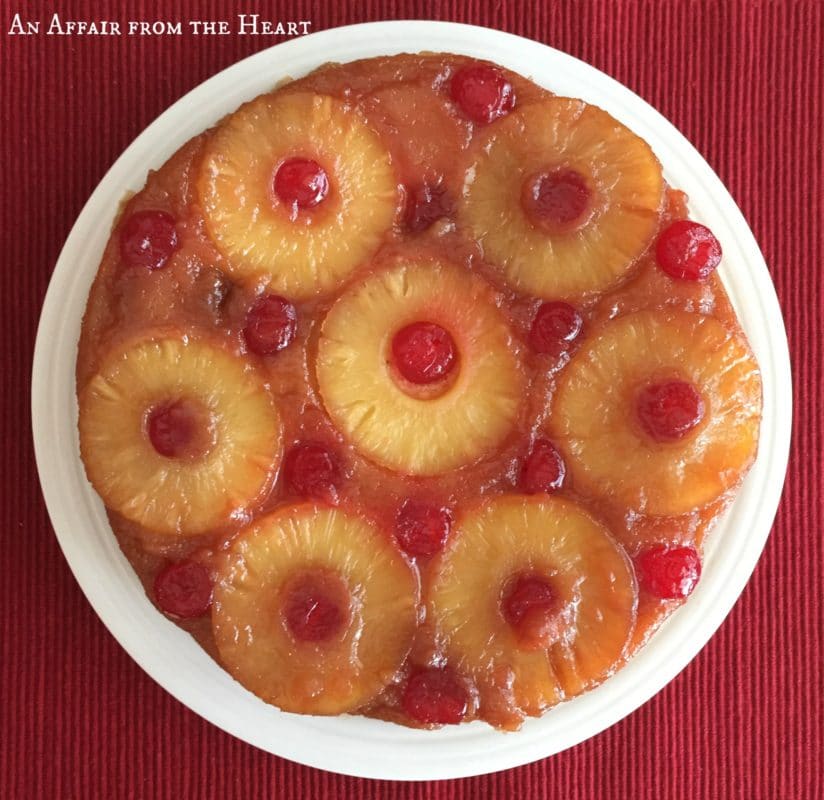 Overhead of From Scratch Pineapple Upside Down Cake on a whit plate
