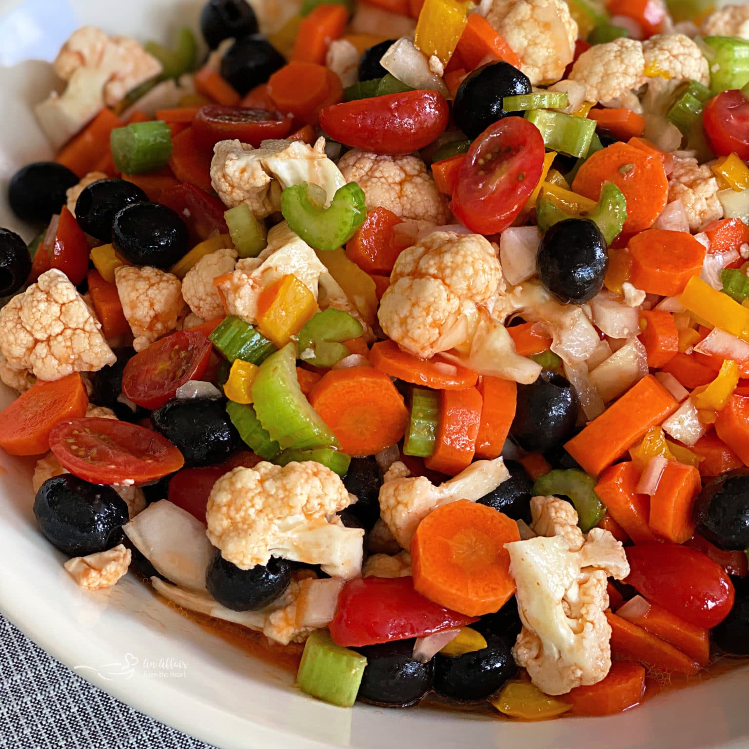 Marinated Vegetables fresh colorful raw veggies in a sweet dressing.