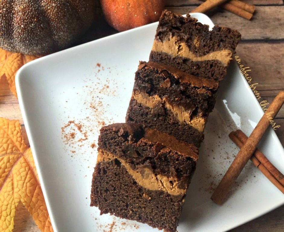 Pumpkin Cheesecake Swirl Brownies on a white plate