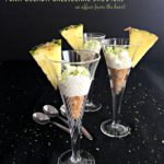 Side view of shooters with text "Pina Colada Cheesecake Shooters"