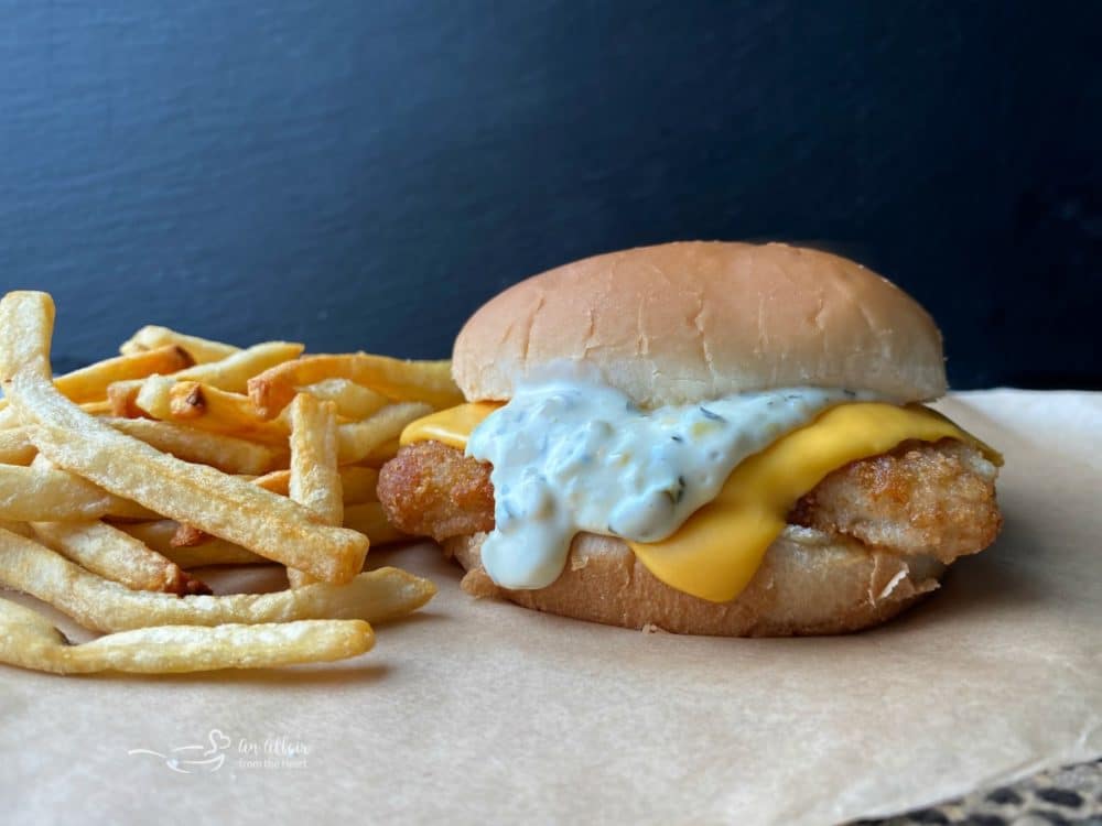 close up view fish sandwich and fries