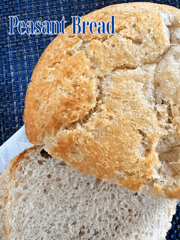 top view of peasant bread with slice cut 