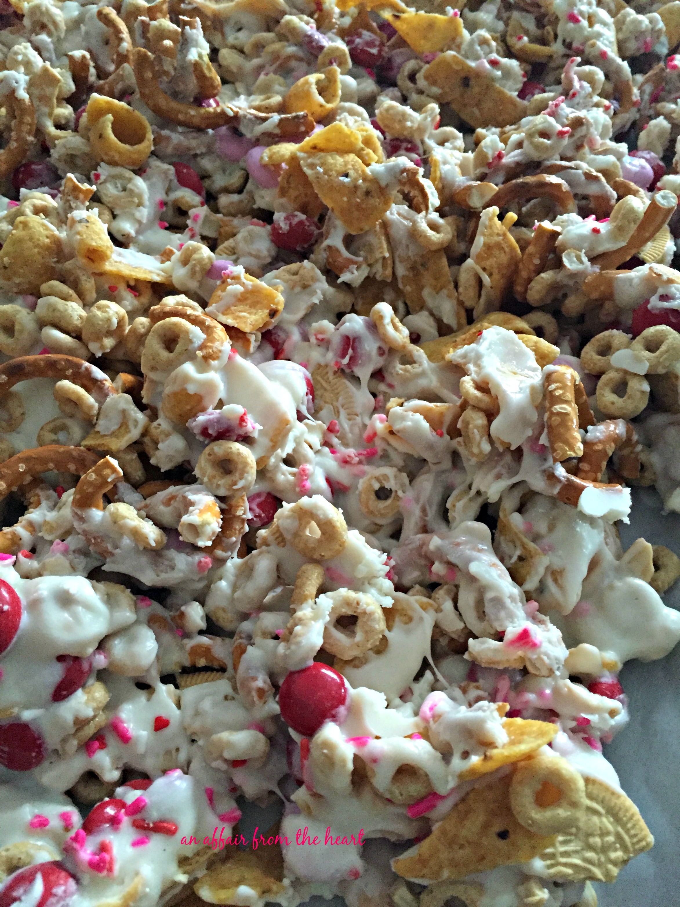 Mixing Ingredients for White Chocolate Snack Mix