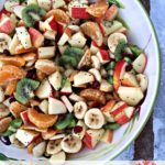 Pinterest image with text "Winter Fruit Salad with Lemon Dressing"