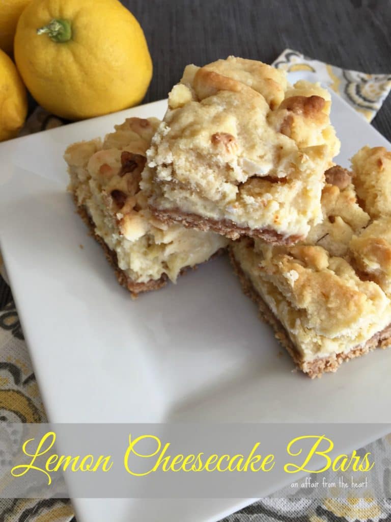 Bars stacked on a white plate with text "Lemon Cheesecake Bars"