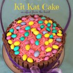 Overhead of cake with text "Easter Basket Kit Kat Cake"