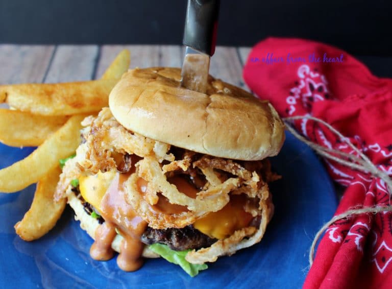 Western Burger and fries on a blue plate