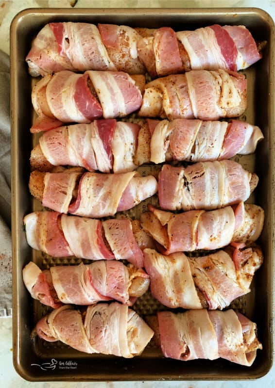 Wrap each piece of chicken with a slice of bacon