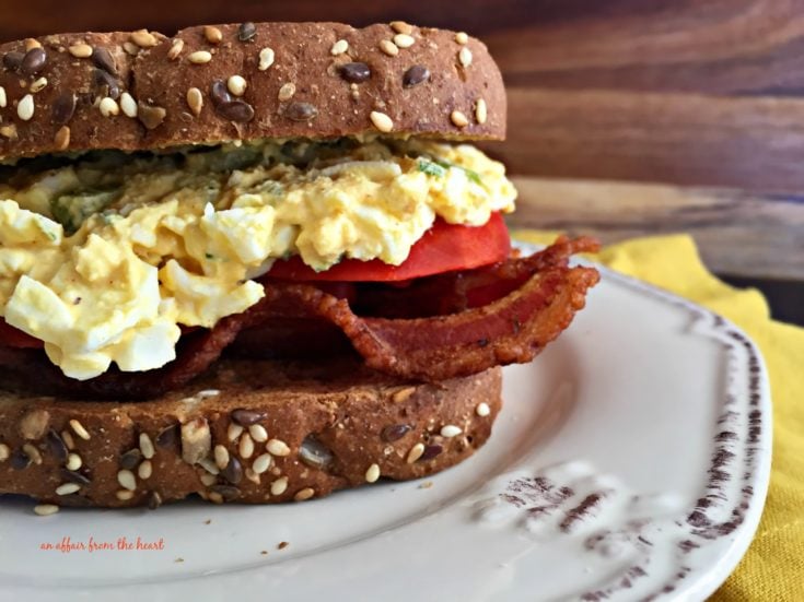 close up of BEST {Bacon, Egg Salad & Tomato} Sandwich