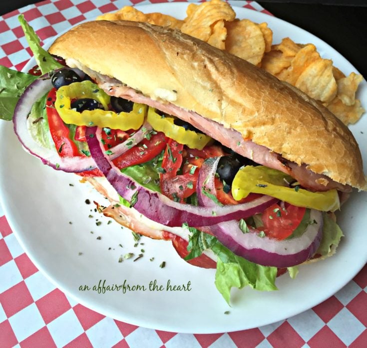 close up of Toasted Italian Sub Sandwich on a white plate