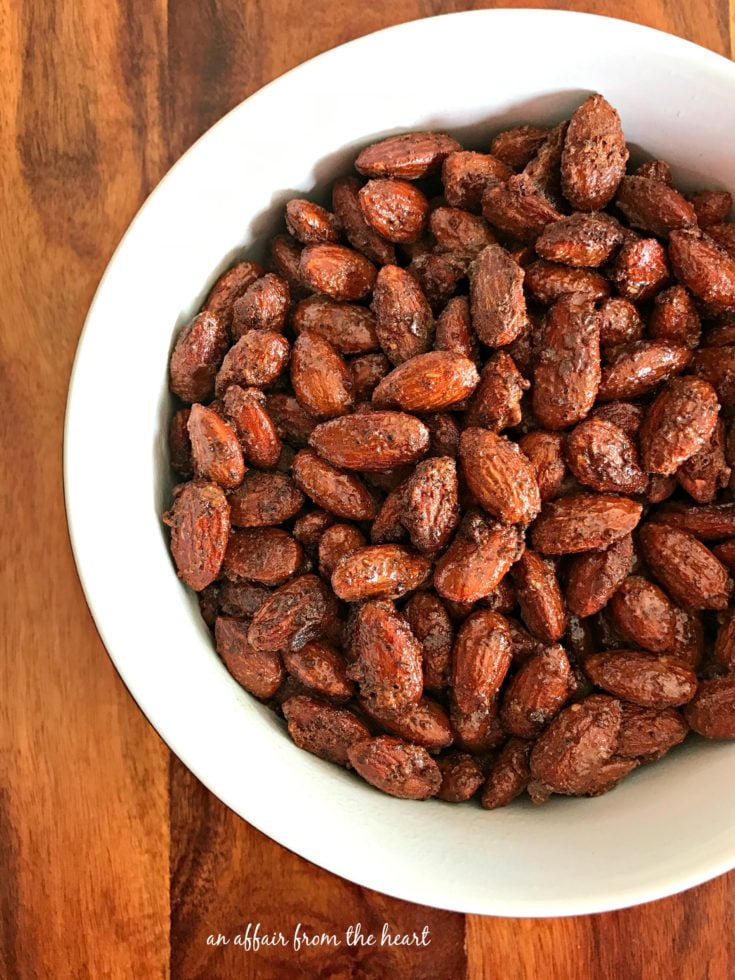 Spicy Smoked Almonds in a white bowl