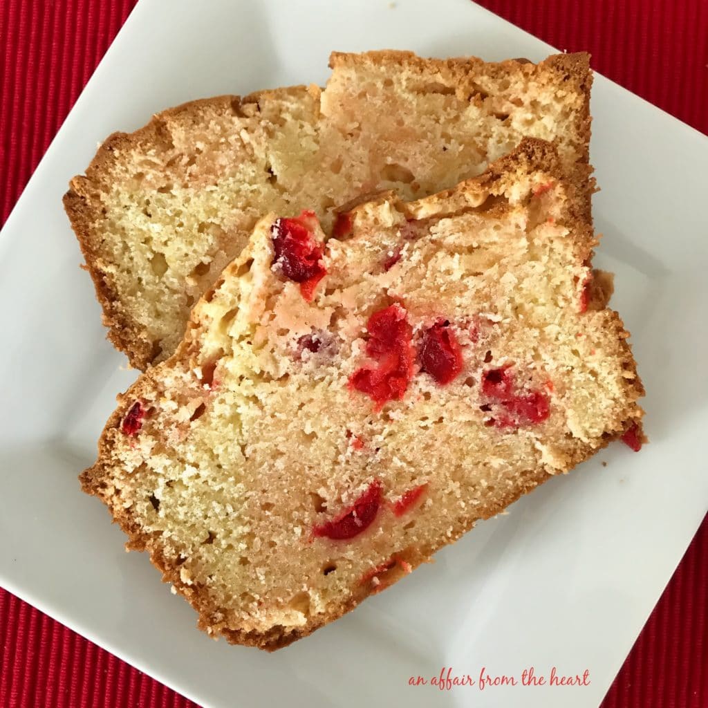 close up of a slices of Cherry Cheese Bread on a white plate