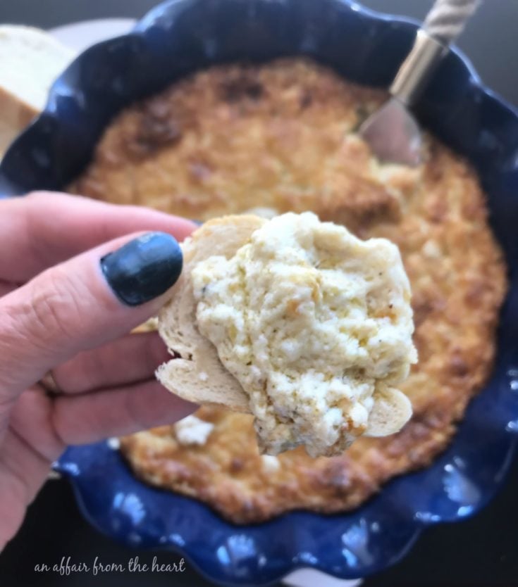 close up of Baked Onion Dip on a chip