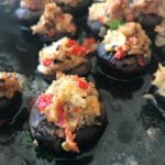 Close up of Seafood Stuffed Mushrooms cooking