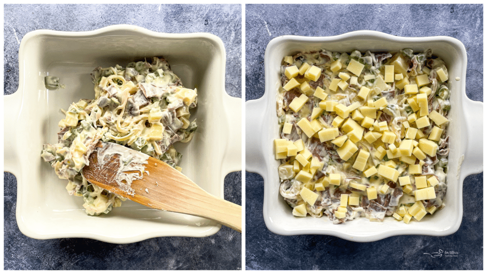 cheese steak dip in baking dish with wooden spoon
