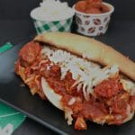 Instant Pot Twisted Meatball Subs on a blue plate