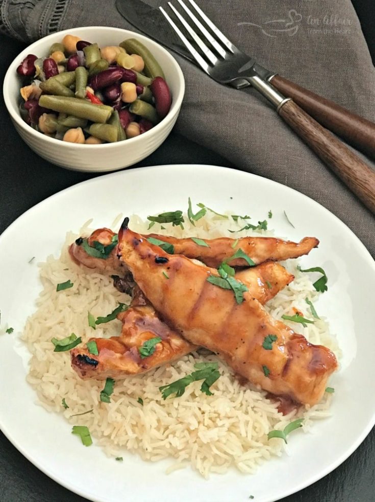 Apricot BBQ Glazed Chicken and rice on a white plate