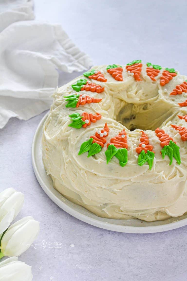 Side view of Carrot Bundt cake with Cream Cheese frosting.