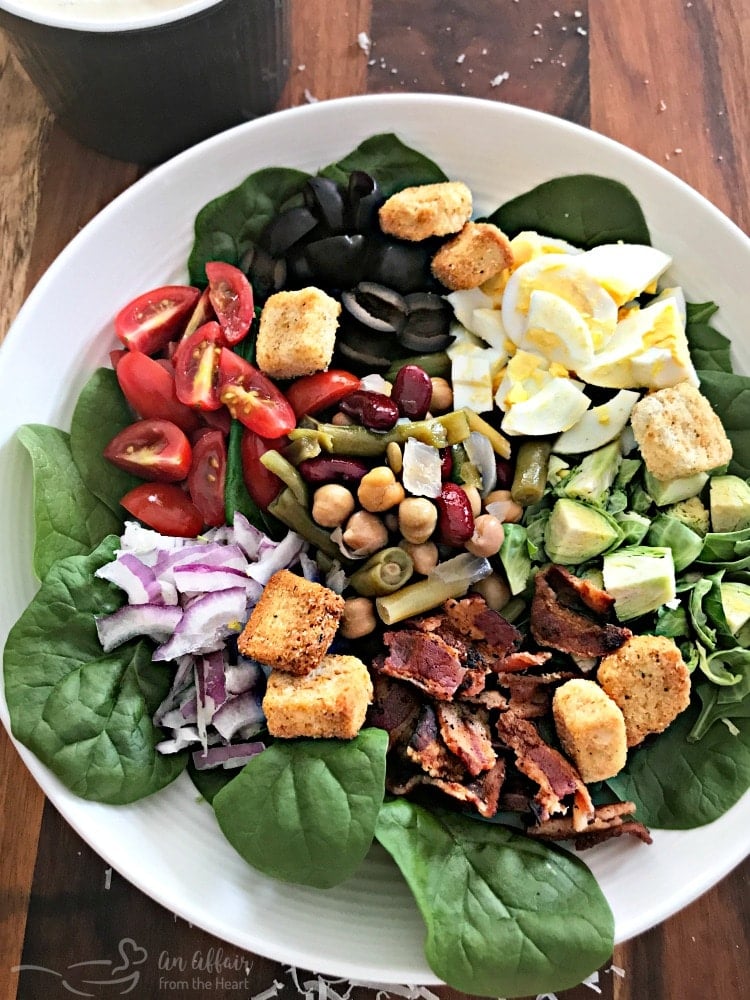 Loaded Spinach Salad with Creamy Roasted Garlic Dressing