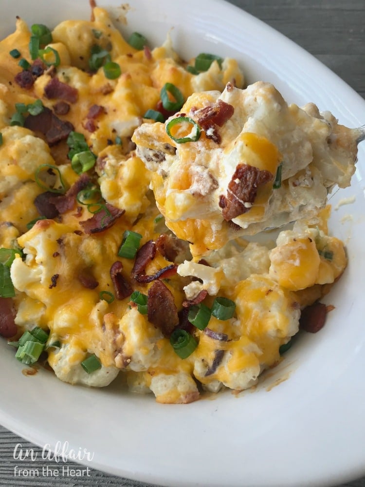 Loaded Cauliflower Casserole close up on a spoon