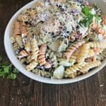 Close up of Creamy Italian Four Bean Pasta Salad in a white bowl