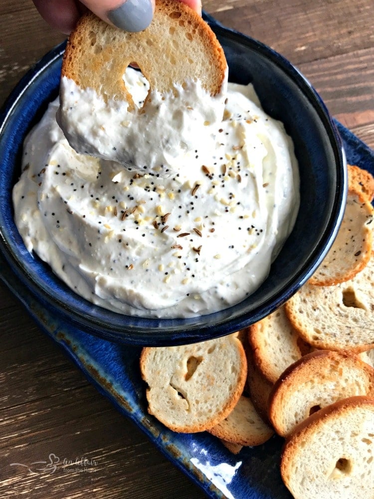 Everything Bagel Dip in a blue bowl