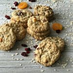 Cranberry Apricot Oatmeal Cookies stacked on a wood table