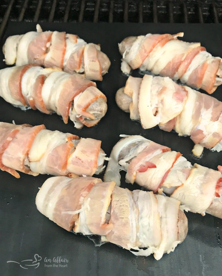 Kraut Stuffed Bacon Wrapped Brats