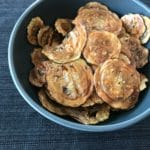 Italian Style Baked Zucchini Chips in a blue bowl