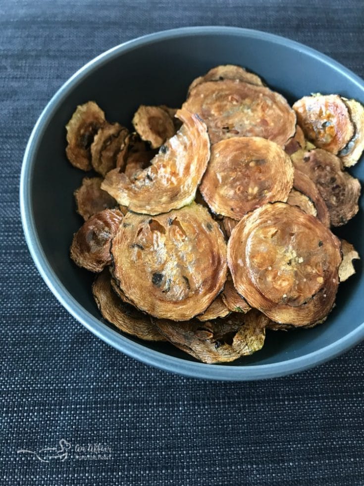 Italian Style Baked Zucchini Chips in a blue bowl