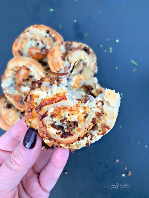 Steak & Kraut Pinwheels with Caramelized Onions and White Cheddar Cheese