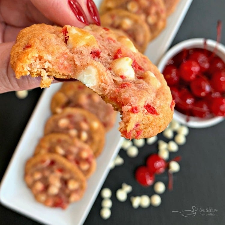 Close up of a bite out of a White Chocolate Cherry Cookies