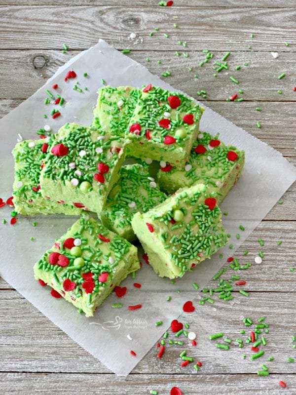 Grinch Fudge stacked on parchment paper