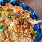 Baked Chili Cheese Bean Dip close up on a spoon
